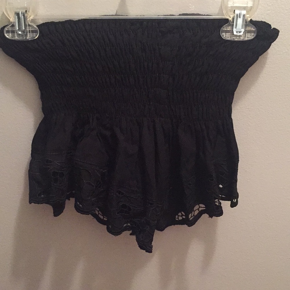 Black bathing suit cover up shorts.